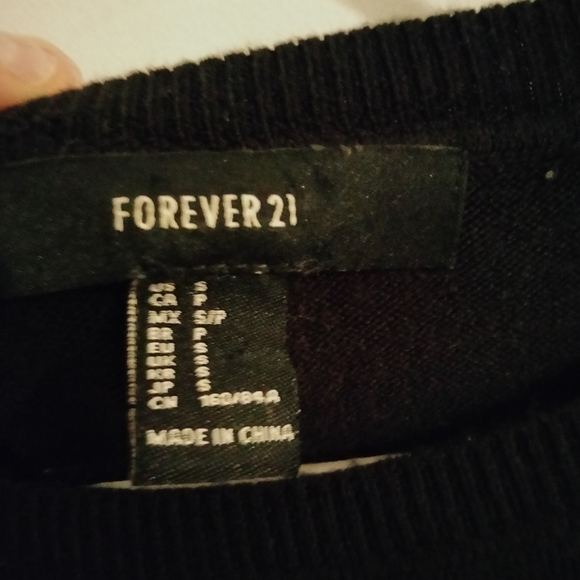 Black sweater dress with black lace on bottom - Picture 4 of 4